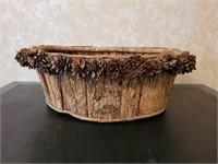 Bark basket with pine cones attached. 7x18x15.