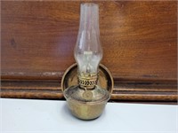 Brass plated oil lamp with wall hanger. 7½x4.