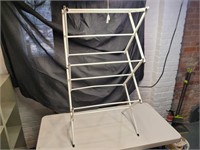 Collapsible clothes drying rack. 41x22x15.