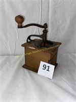 Coffee Grinder made of Cast Metal and Wood