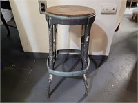 Metal stool with wood seat. 25in seat.