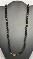 Religious Black & Gold Bead Necklace