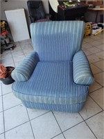 Blue and white striped upholstered armchair