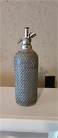 Vintage wire mesh wrapped glass Seltzer bottle