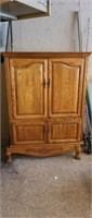 Oak 4-door armoire cabinet