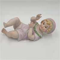 Vintage Piano Baby Figurine Girl Laying Down