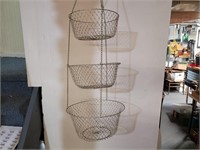 Hanging wire baskets.
