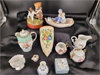 Assorted ceramic and porcelain decorative pieces.