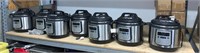 LOT OF 7 USED PRESSURE COOKERS, (STORE RETURN)