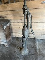 Antique hand pump made by Stock