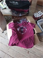 Box full of new old stock t-shirts different sizes