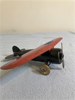 Vintage metal toy airplane