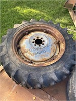 Rear wheels and tires off 8N Ford tractor.