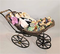 VICTORIAN WICKER CARRIAGE FILLED WITH DOLLS