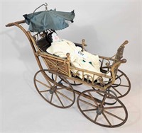 DOLL CARRIAGE AND CHINA-HEAD DOLL
