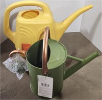(CY) Lot of metal/plastic watering cans.  Plastic