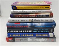 Collection of books including Elmore Lenard who
