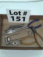 Assorted tools - needle nose pliers, lighter,