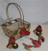 wire basket of bird figurines/tealights