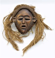 African Tribal Mask with Raffia Hair.