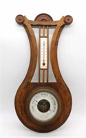 J. Davignon Aneroid Lyre Form Barometer.