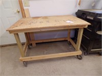 Rolling wood shop table