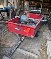 Huskee lawn wagon with fencing supplies and tools
