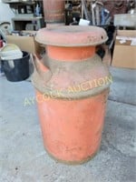 Antique milk can with "Borden" markings