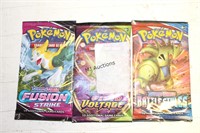 (3) Packs Of Pokemon Trading Cards -Unopened