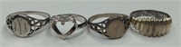 4 Sterling silver rings, total weight is
