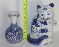 blue white cat and vase
