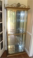 metal and glass lighted curio cabinet