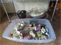 Collection of glassware in tote and shelf