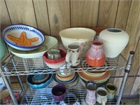 Contents of pottery on shelf