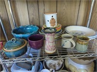 Collection of pottery on shelf