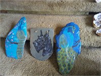 2 painted rocks and one slate