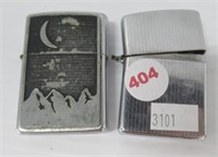 (2) Vintage Zippo Lighters.