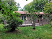 3.83+/- Acres With a Cabin, Garage and Large Shop