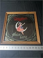 Miller high life mirror approximately 14 inches.