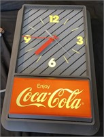 “Enjoy Coca-Cola” lighted clock