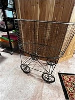 Vintage laundry basket on wheels