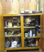 Contents of cupboard that includes spray gun,