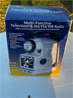 Multifunction television am fm radio siren light