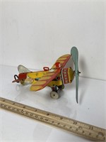 Vintage tin plate wind up plane