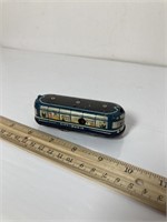 Vintage mechanical tin plate toy bus