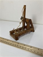 Vintage miniature Mid Evil catapult