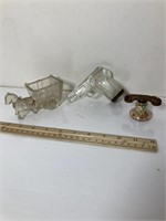 Vintage cart, gun, and phone candy containers