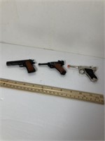 Vintage cap pistols Lugers and 45