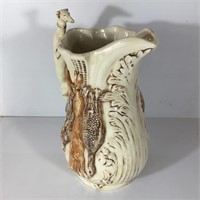 CERAMIC PITCHER HUNTING THEME IN RELIEF