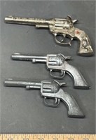 Three Vintage Cap Guns Including Star